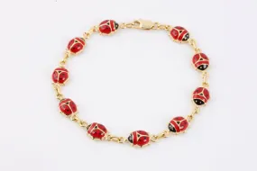 7 14k Yellow Gold Enamel Ladybug Bracelet (6.00g.)