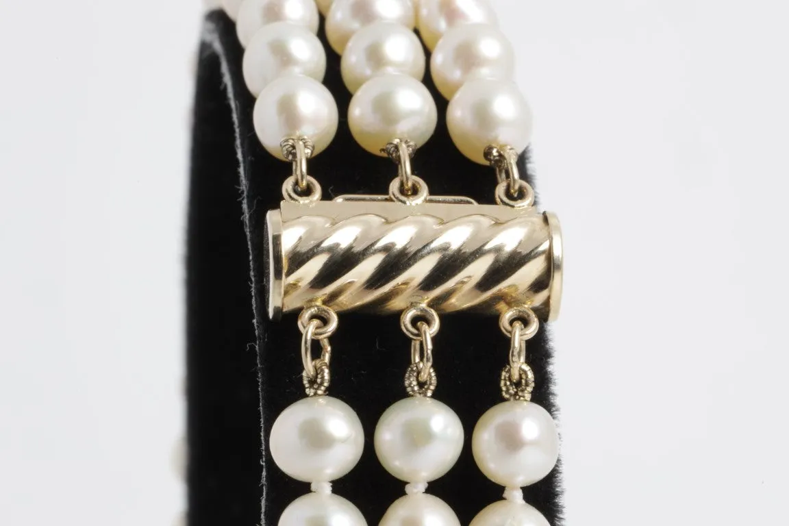 7.5'' 14k Yellow Gold 3 Strand Pearl Bracelet (19.40g.)