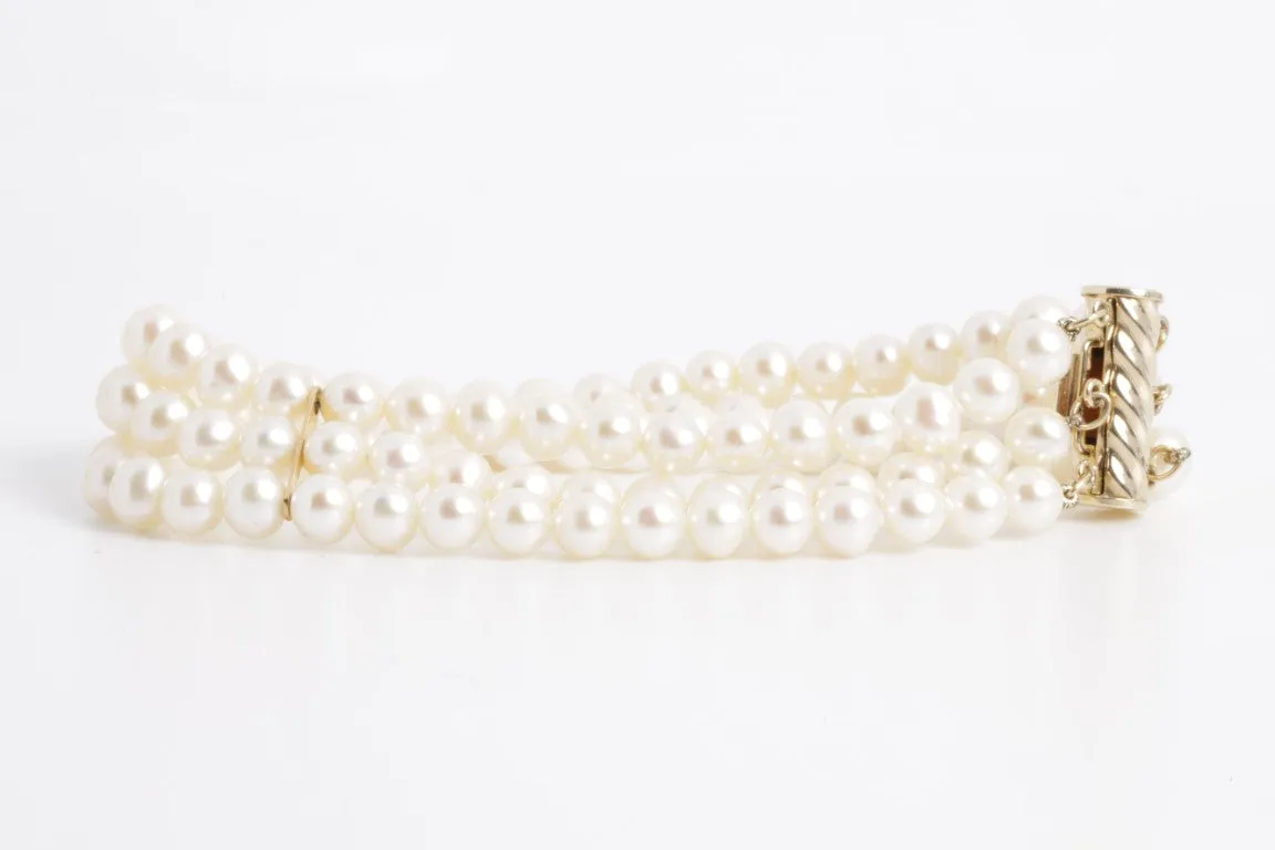 7.5'' 14k Yellow Gold 3 Strand Pearl Bracelet (19.40g.)